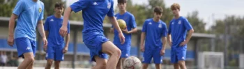 Young players training together during a football academy session on the field